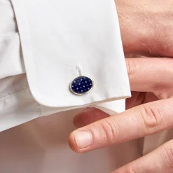 GEMELLI DA POLSO IN ARGENTO BLUCon microfantasia fiore